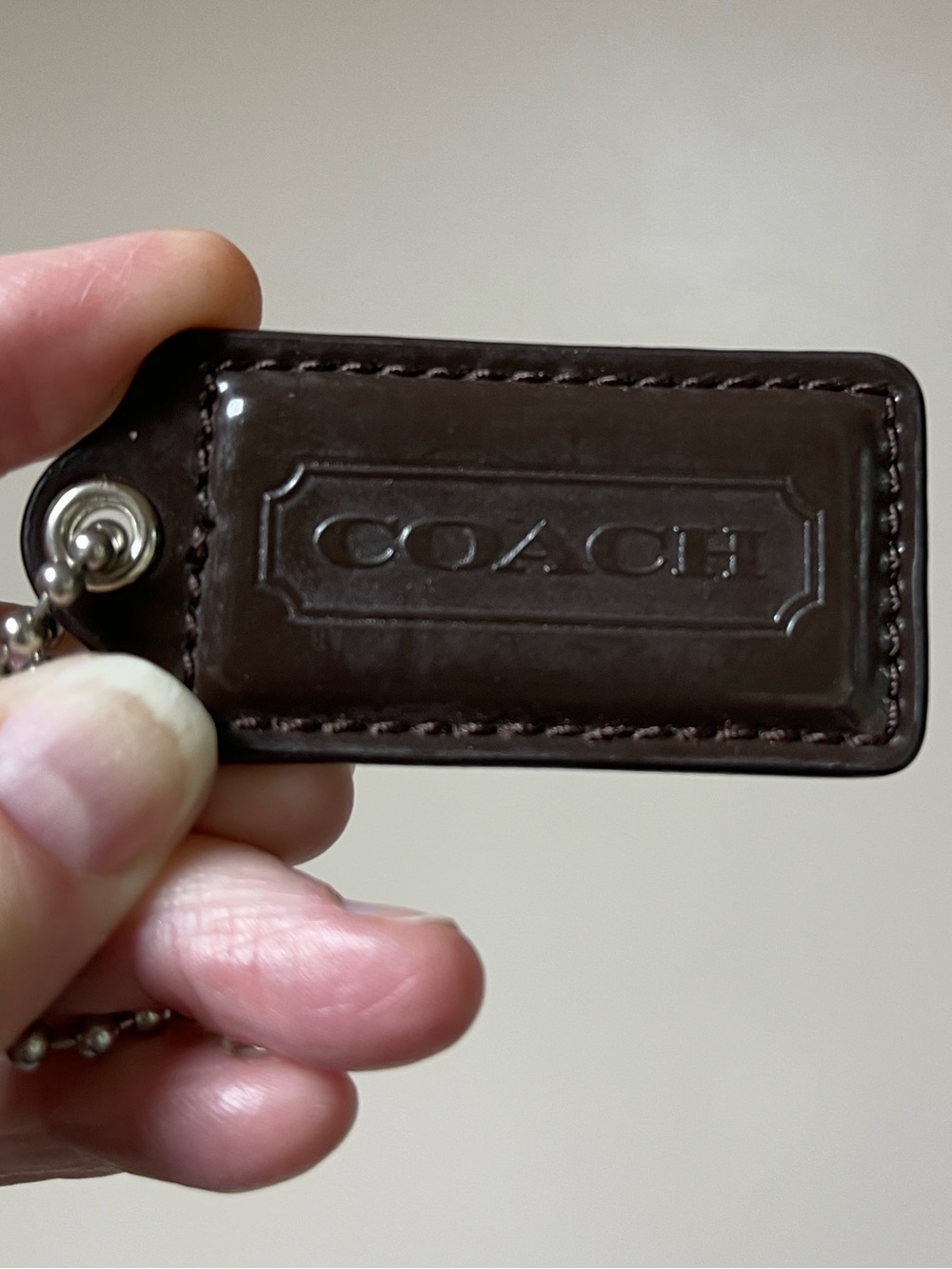 Coach Dark Brown Leather Hang Tag with Embossed Logo and Ball Chain